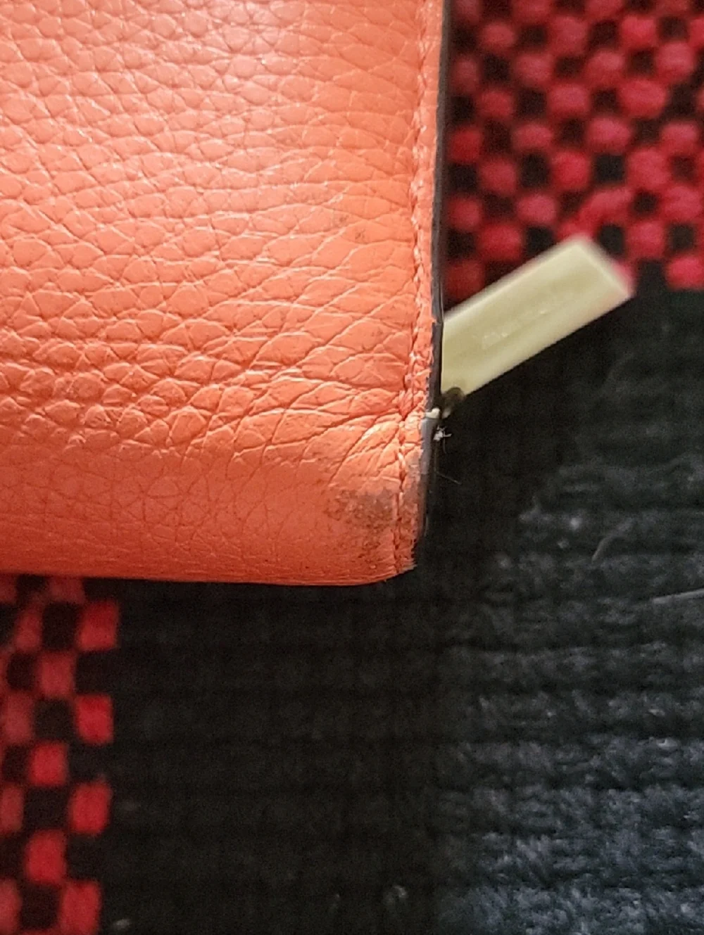 kate spade coral orange pebble leather zip-around wallet